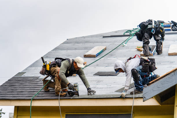 Professional Roofing technician working in Sanger, CA